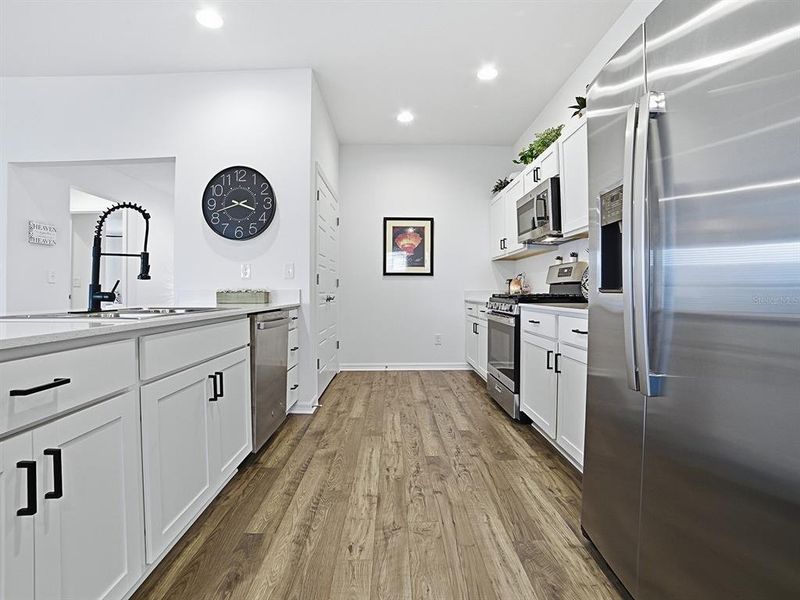 Furnished interior view inside a new home in , The Villages (Image 15).