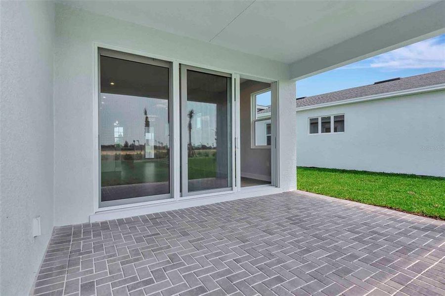 Exterior details and patio area of a home in Cresswind at Lake Harris, Tavares (Image 3).