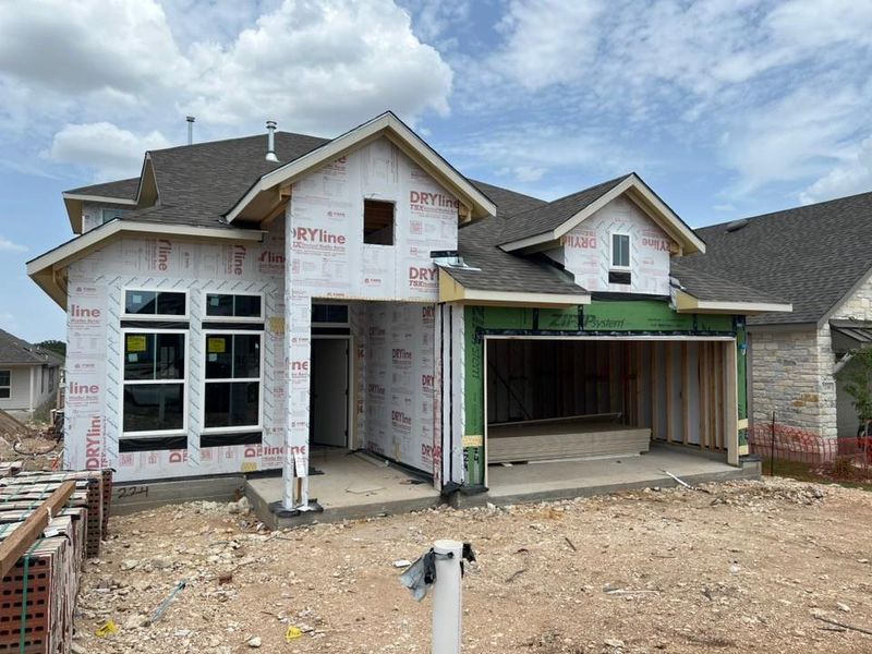 Rear view of house featuring a shingled roof Rear view of house featuring a shingled roof