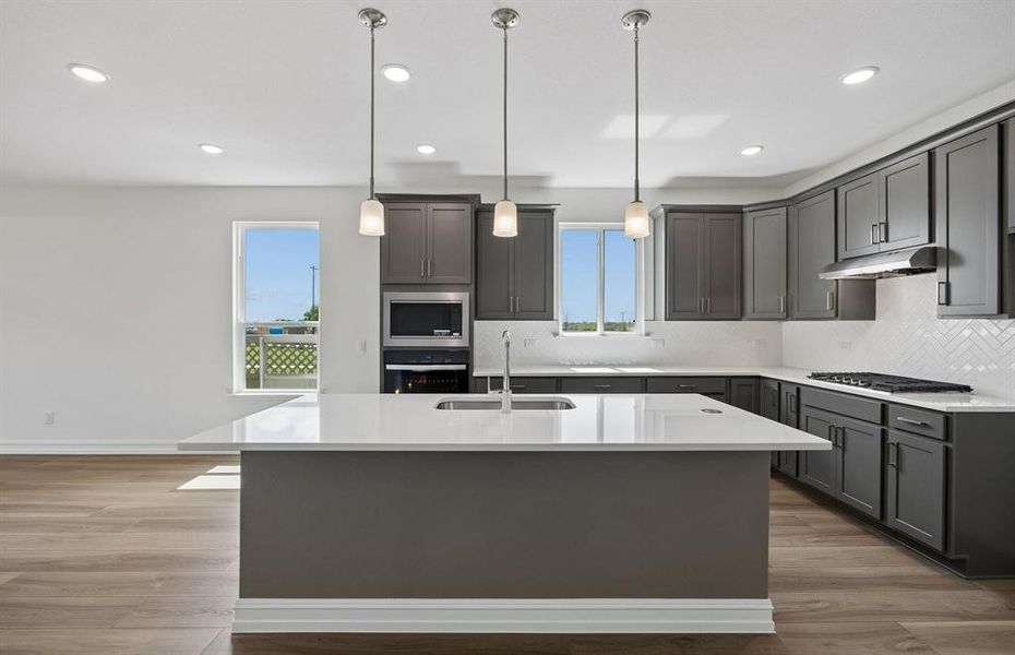Kitchen with eat-in bartop island Kitchen with eat-in bartop island