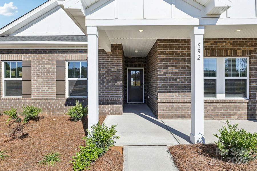 Exterior details and patio area of a home in Brighton Springs, York (Image 3).