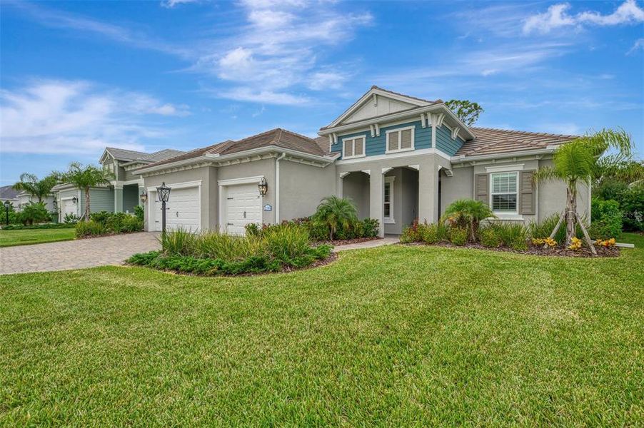 Front exterior of a new home in , Venice, FL, highlighting curb appeal (Image 28).