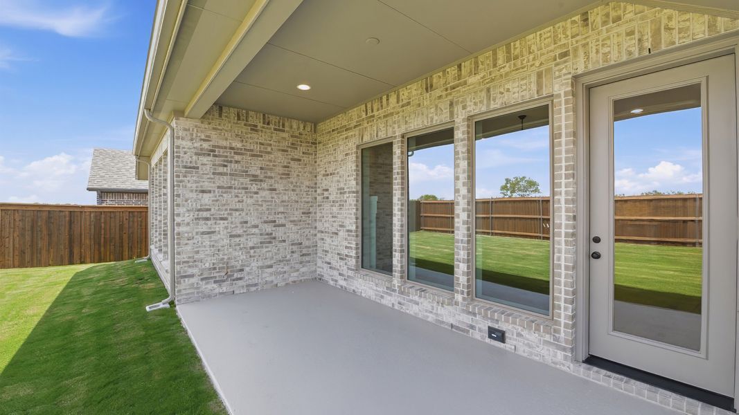 Exterior details and patio area of a home in Meraki, Forney (Image 4).