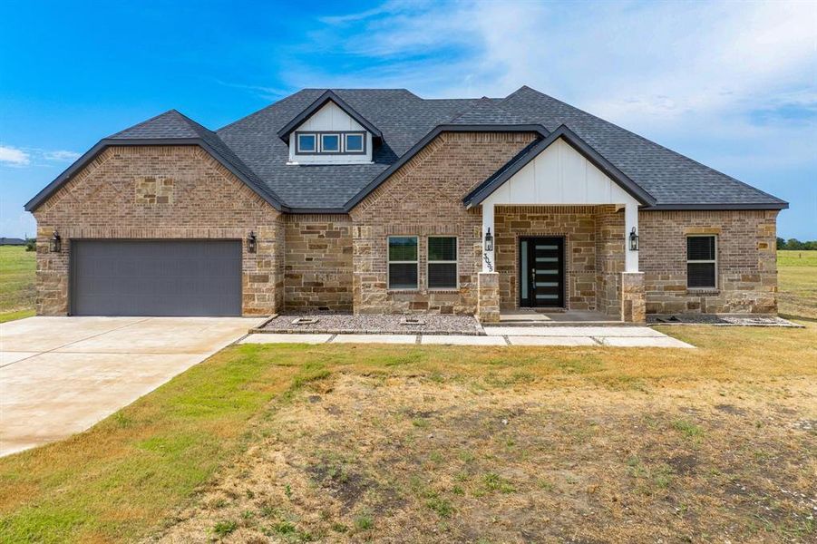 Front exterior of a new home in , Greenville, TX, highlighting curb appeal (Image 21).
