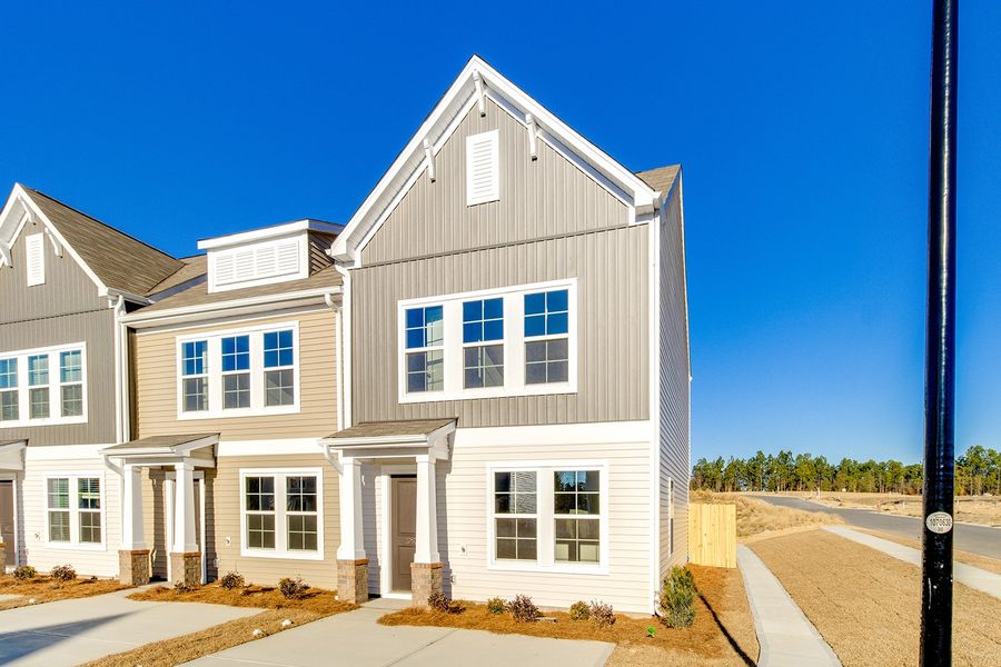 Front exterior of a new home in Astoria, Columbia, SC, highlighting curb appeal (Image 18).