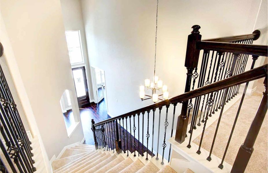 Representative unfurnished interior of a home built from the 4198 by Ravenna Homes in The Woodlands Hills 65′, Willis (Image 26).