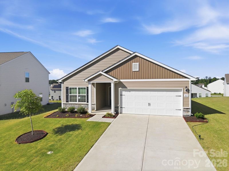 Front exterior of a new home in Stagecoach Station, Gastonia, NC, highlighting curb appeal (Image 20).