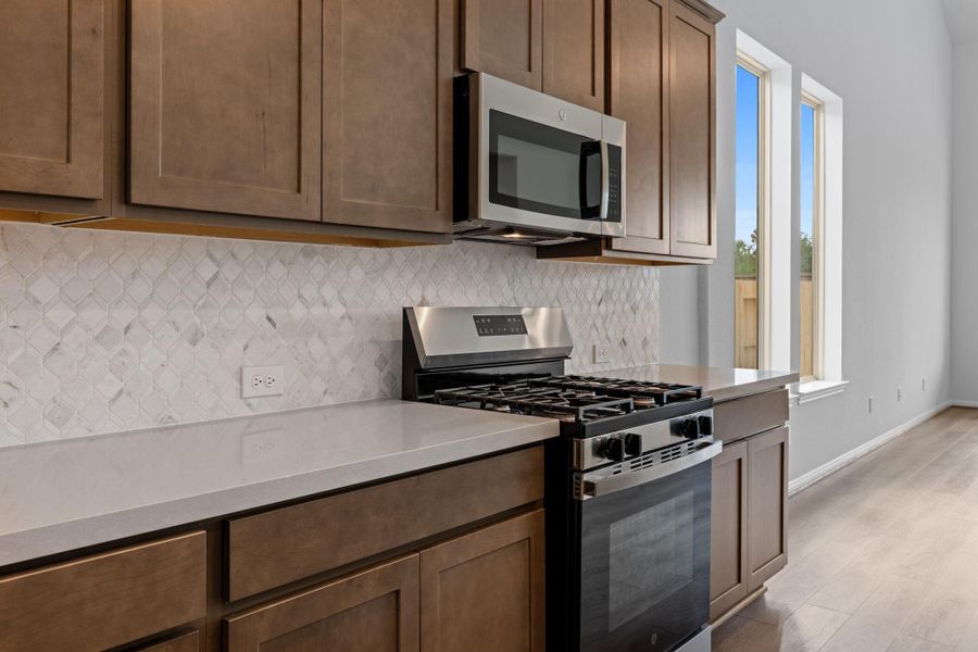 This kitchen is not only a functional space but also has ample storage. Whether you're a seasoned chef or just love to gather and enjoy good food, this kitchen is a dream come true. This kitchen is not only a functional space but also has ample storage. Whether you're a seasoned chef or just love to gather and enjoy good food, this kitchen is a dream come true.