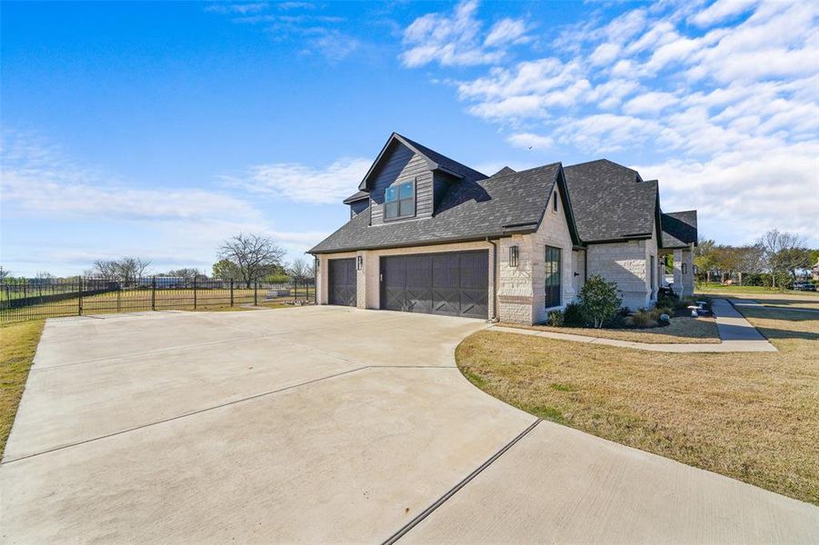 Front exterior of a new home in , Rockwall, TX, highlighting curb appeal (Image 23).