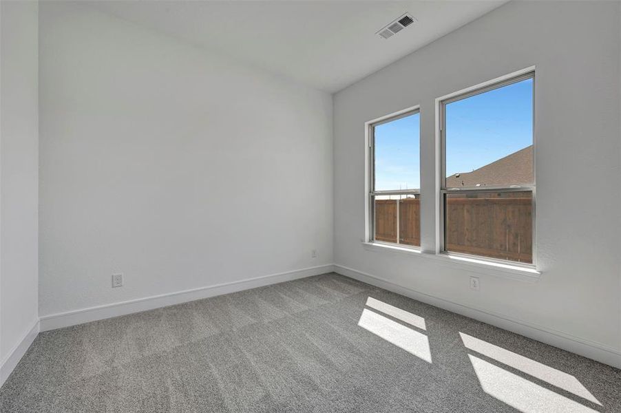 Spacious, unfurnished interior of a new home in Wellington, Haslet (Image 22).