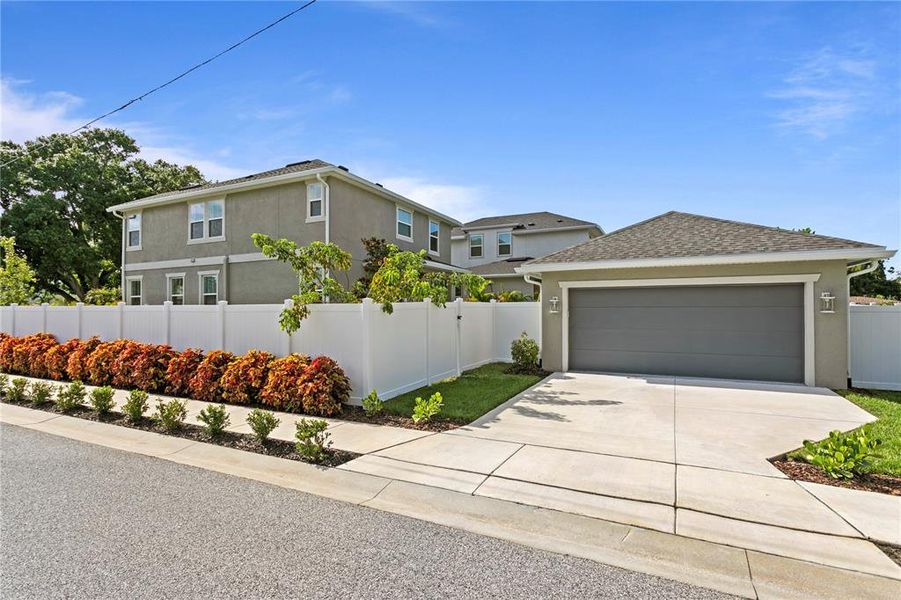Front exterior of a new home in , St. Petersburg, FL, highlighting curb appeal (Image 25).