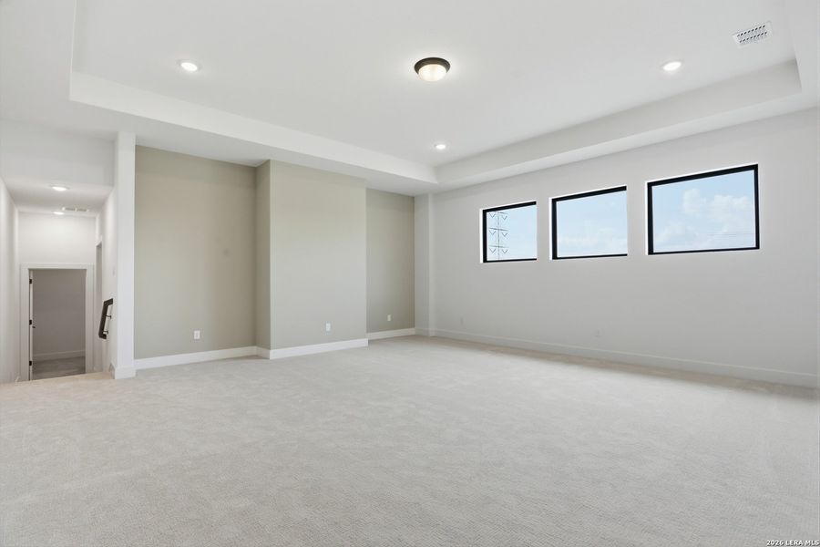 Spacious, unfurnished interior of a new home in Enchanted Bluff, San Antonio (Image 32).