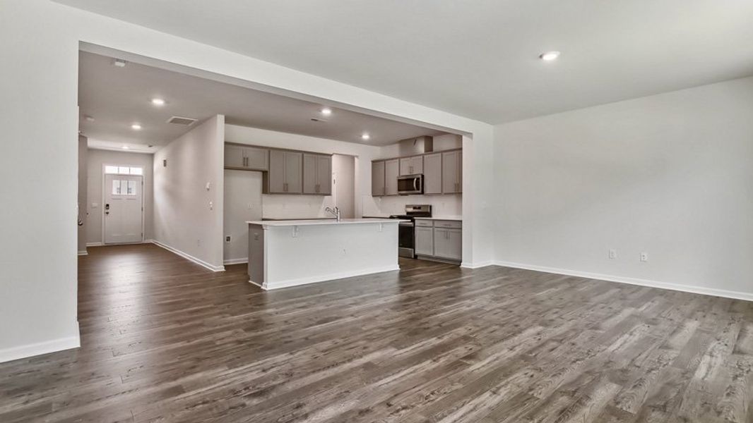 Representative unfurnished interior of a home built from the DANIEL by D.R. Horton in The Townes Park, Apex (Image 14). Representative unfurnished interior of a home built from the DANIEL by D.R. Horton in The Townes Park, Apex (Image 14).