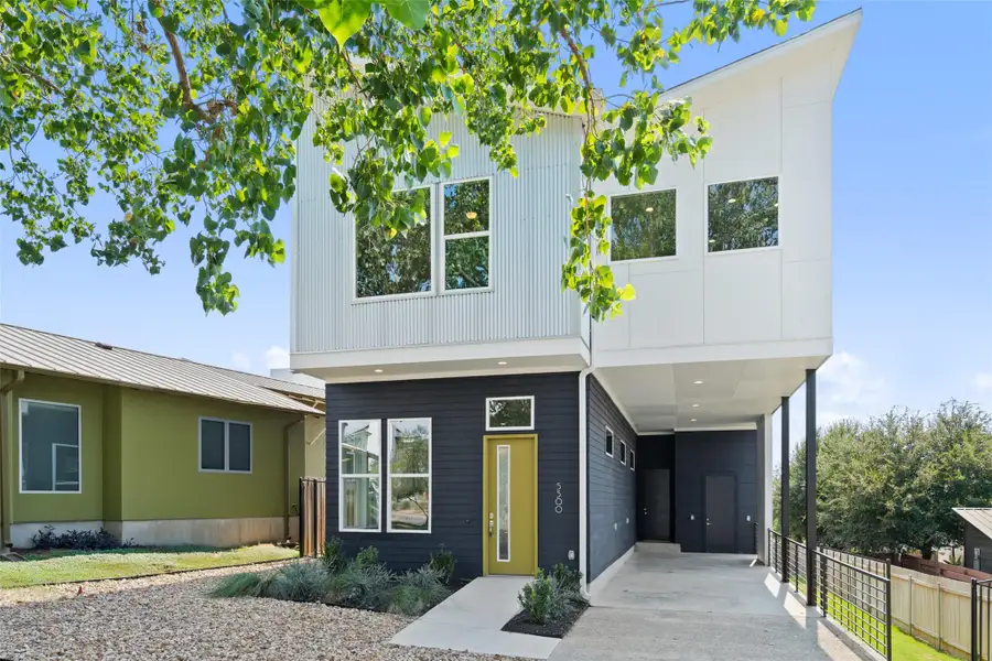 Front exterior of a new home in Agave, Austin, TX, highlighting curb appeal (Image 1). Front exterior of a new home in Agave, Austin, TX, highlighting curb appeal (Image 1).