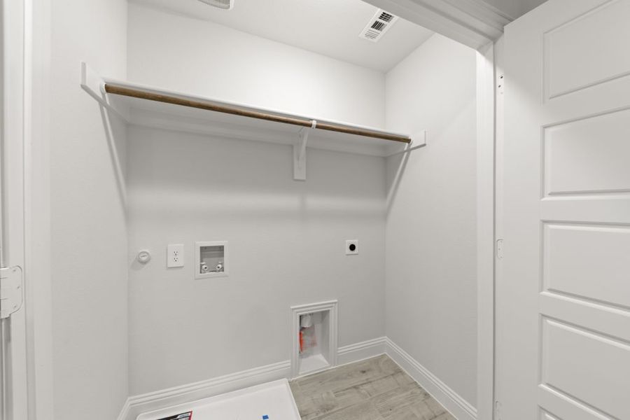 Front exterior of a new home in Sereno Oaks at Buckner Terrace, Dallas, TX, highlighting curb appeal (Image 16). Front exterior of a new home in Sereno Oaks at Buckner Terrace, Dallas, TX, highlighting curb appeal (Image 16).