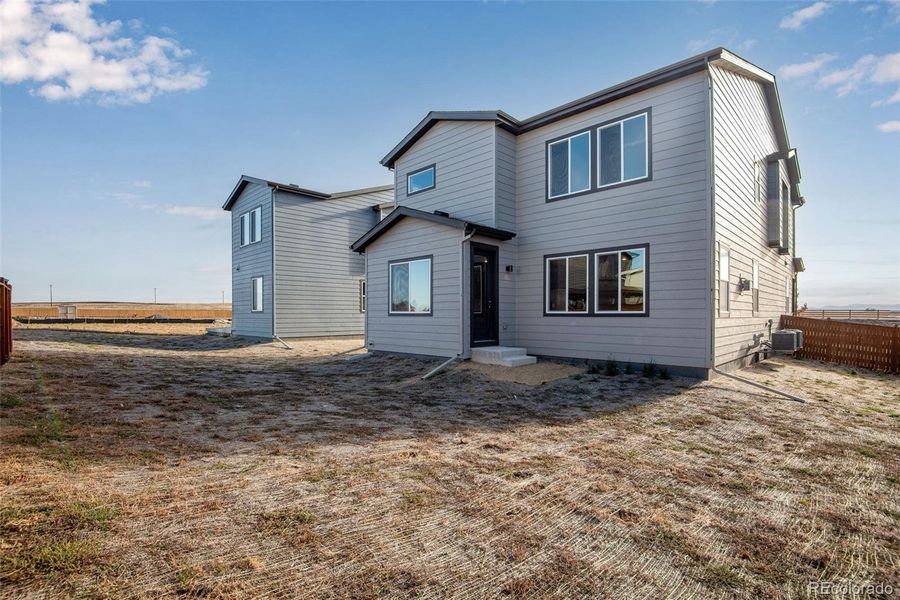 Exterior details and patio area of a home in Medley at Reunion Ridge, Commerce City (Image 4).