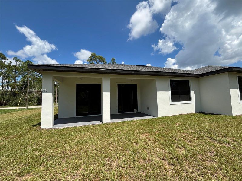 Exterior details and patio area of a home in , Lehigh Acres (Image 29).