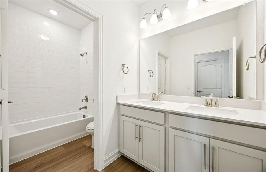 Spacious secondary bathroom with double vanity Spacious secondary bathroom with double vanity