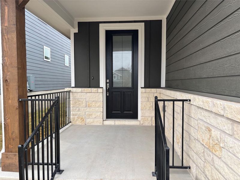 Exterior details and patio area of a home in Cannon Ranch 40s, Dripping Springs (Image 3).
