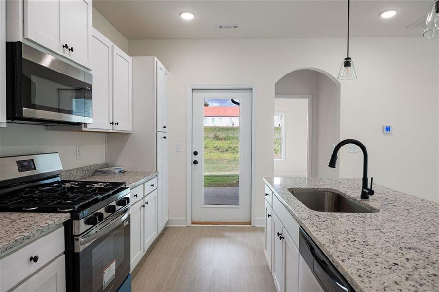 Furnished interior view inside a new home in , Carrollton (Image 6).