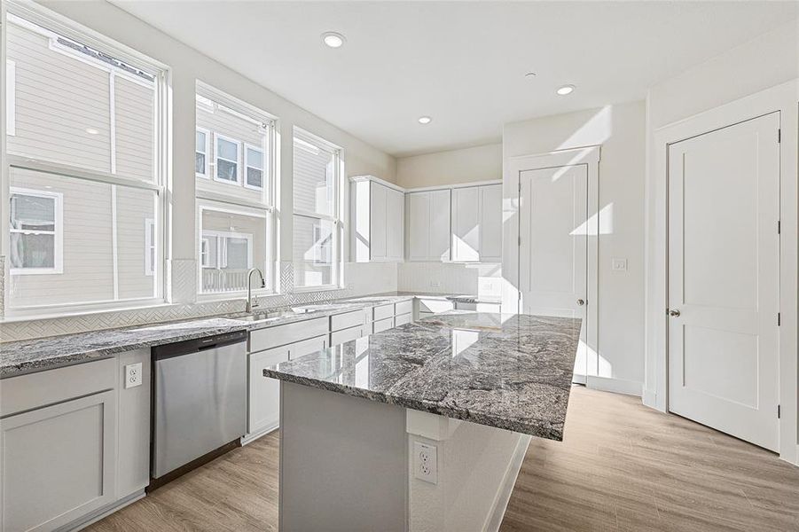 Furnished interior view inside a new home in Collin Creek, Plano (Image 9).