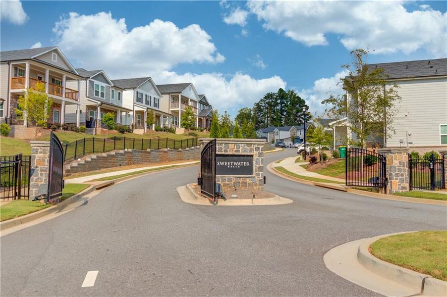 Front exterior of a new home in Sweetwater Green - Royal Series, Lawrenceville, GA, highlighting curb appeal (Image 23).