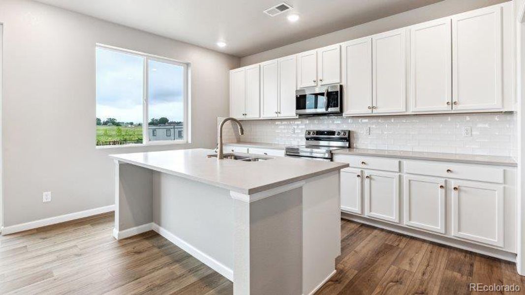 Furnished interior view inside a new home in Highlands Preserve, Mead (Image 9).