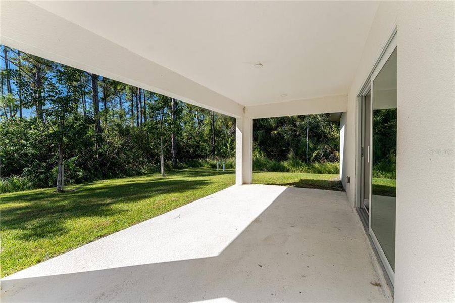 Exterior details and patio area of a home in , North Port (Image 33).