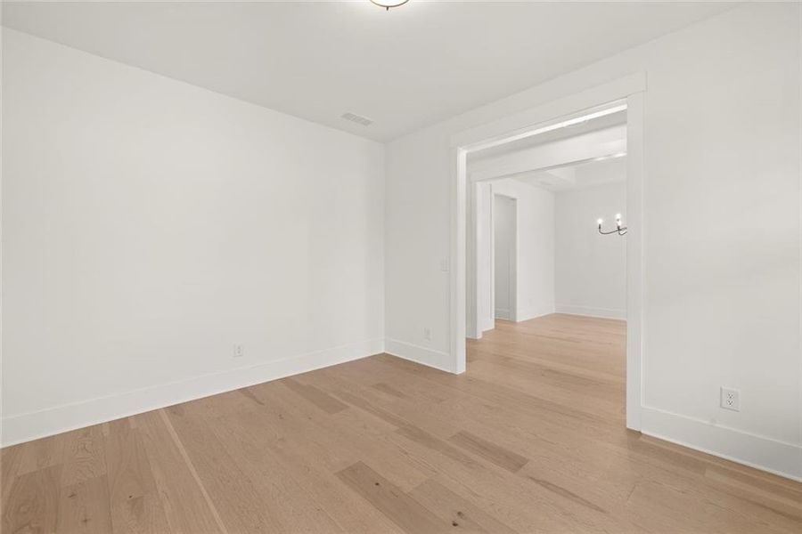 Spacious, unfurnished interior of a new home in Soleil Belmont Park, Canton (Image 22).