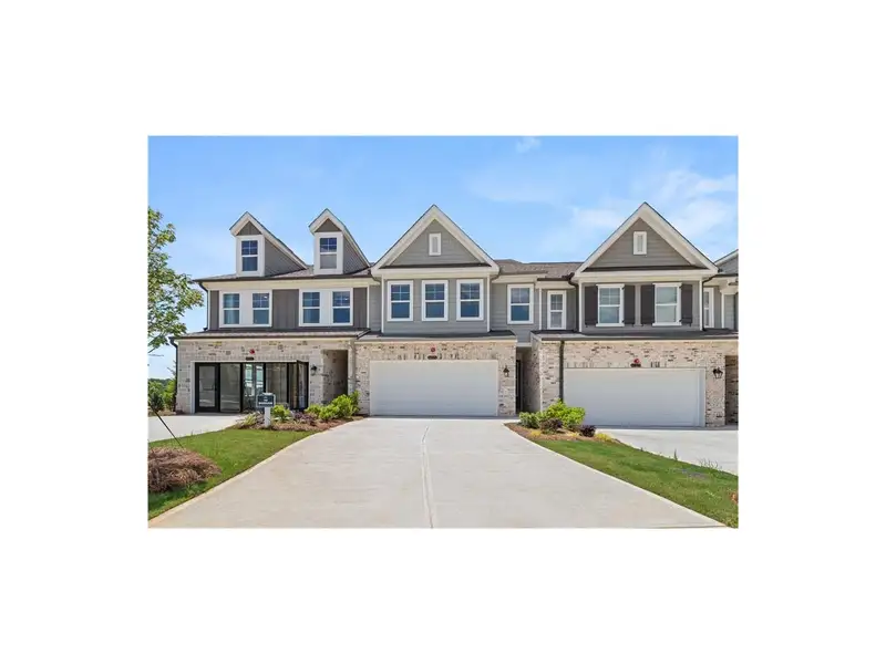 Front exterior of a new home in Hemingway, Cumming, GA, highlighting curb appeal (Image 1). Front exterior of a new home in Hemingway, Cumming, GA, highlighting curb appeal (Image 1).