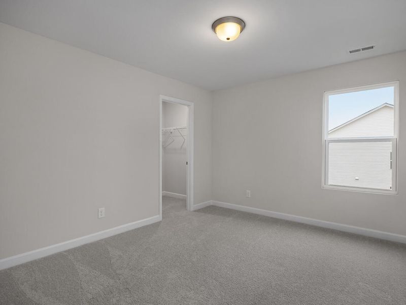 Spacious, unfurnished interior of a new home in Wellers Knoll, Lillington (Image 24).