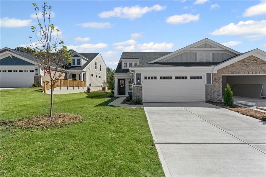 Front exterior of a new home in Villas at Gold Creek, Dawsonville, GA, highlighting curb appeal (Image 2). Front exterior of a new home in Villas at Gold Creek, Dawsonville, GA, highlighting curb appeal (Image 2).