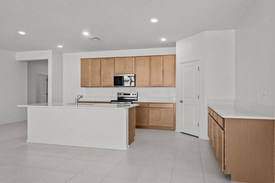 Furnished interior view inside a new home in Ventana de Estrellas Enclaves, Goodyear (Image 3).