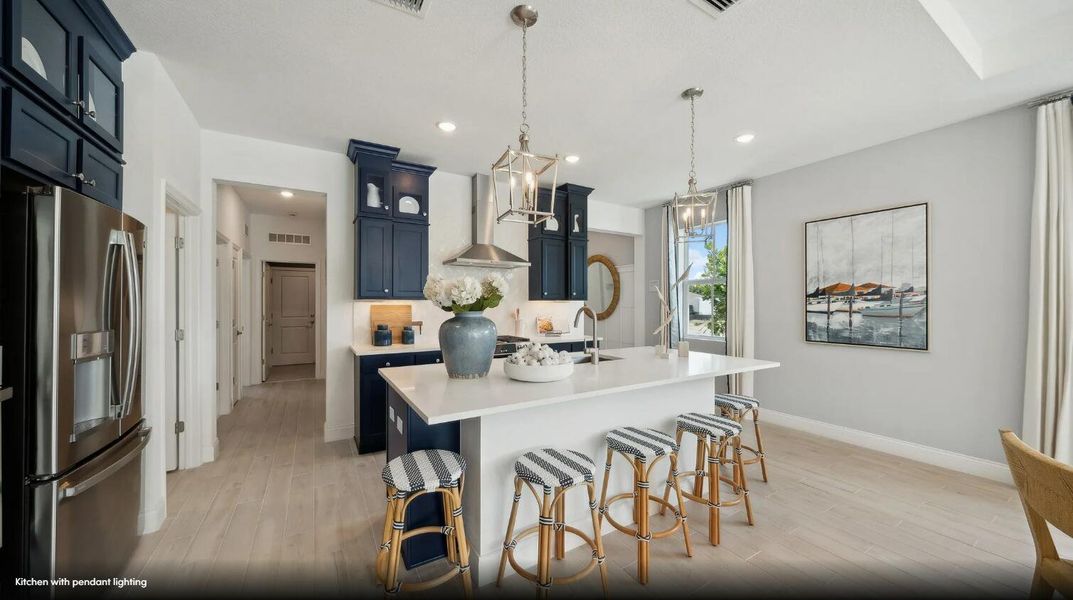 Furnished interior view inside a new home in K. Hovnanian's® Four Seasons at Lakes of Cane Bay, Summerville (Image 6).