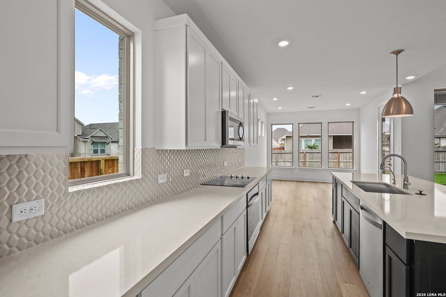 Furnished interior view inside a new home in Megan's Landing, Castroville (Image 32).