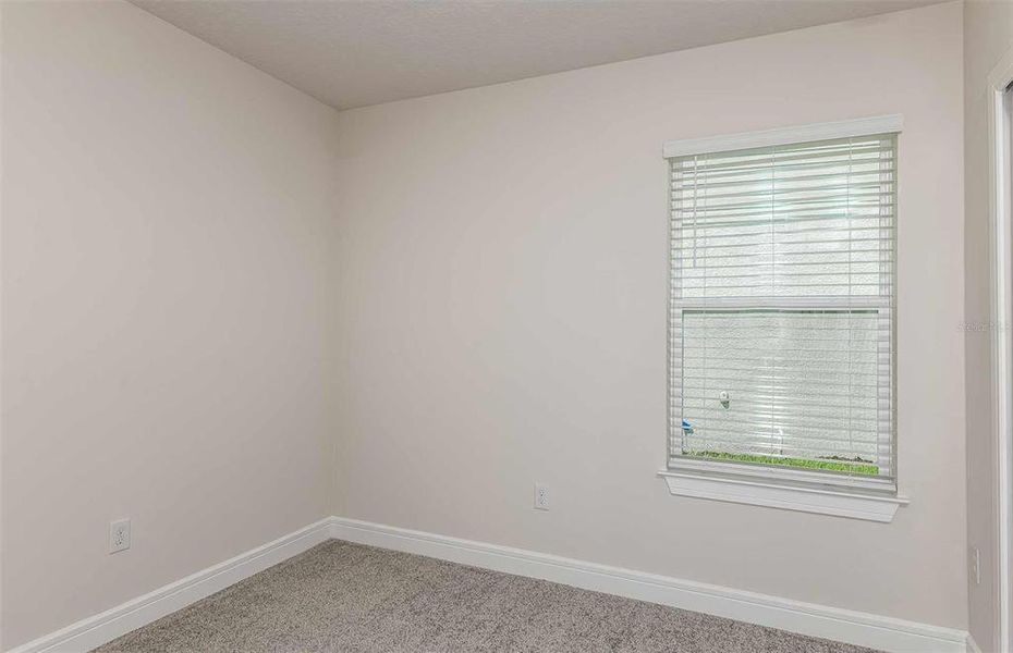 Spacious, unfurnished interior of a new home in Oakfield Lakes, Parrish (Image 9).