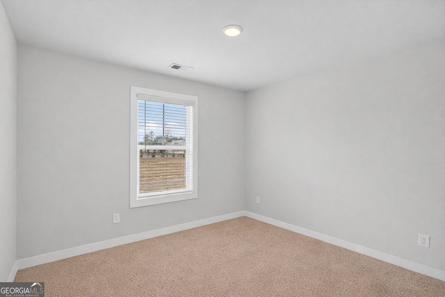 Spacious, unfurnished interior of a new home in The Fairways at Mirror Lake, Villa Rica (Image 34). Spacious, unfurnished interior of a new home in The Fairways at Mirror Lake, Villa Rica (Image 34).
