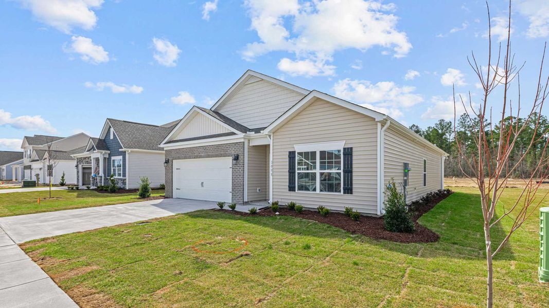 Front exterior of a new home in West New Bern, New Bern, NC, highlighting curb appeal (Image 13).