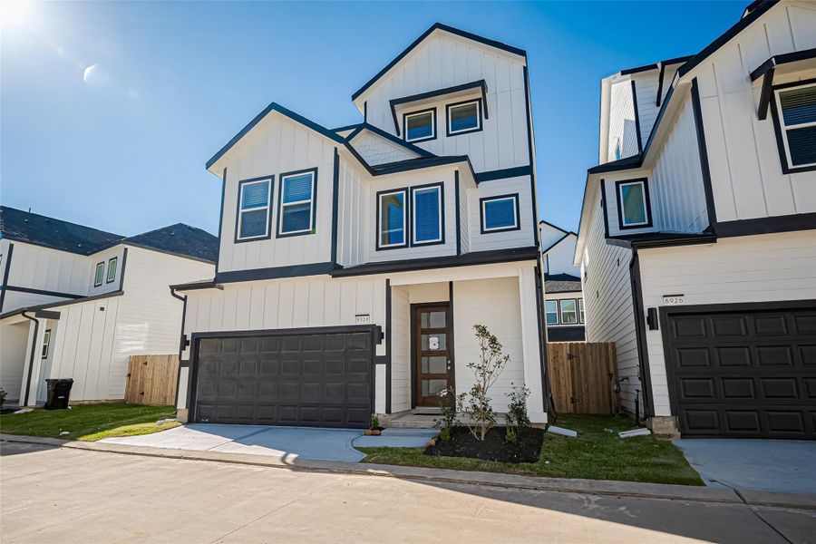 Front exterior of a new home in Regents Court, Houston, TX, highlighting curb appeal (Image 2).
