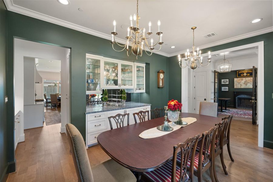 Located at the front of the home, the dining room offers a welcoming space for gatherings and connects seamlessly to the kitchen through the butler's pantry.