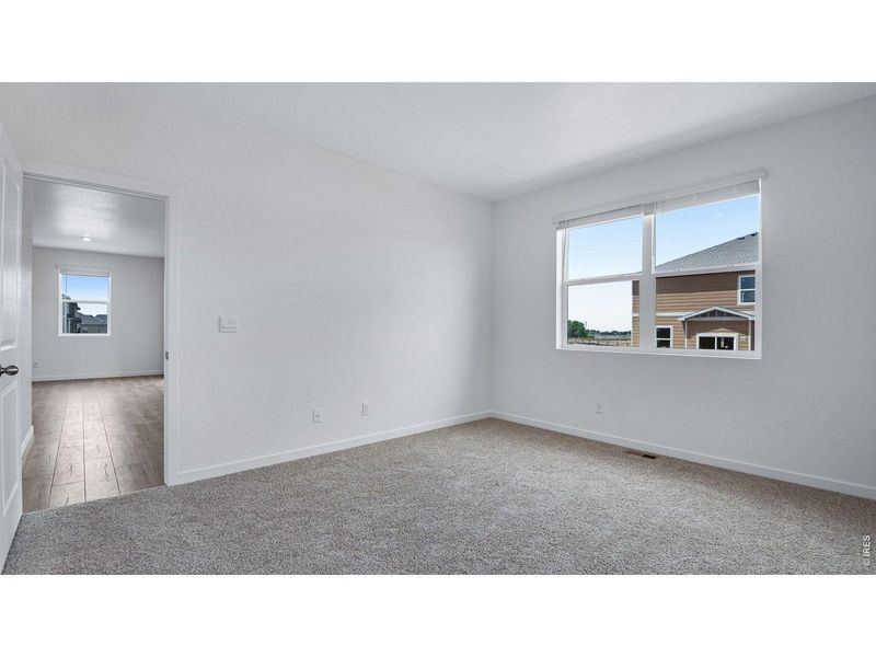 Spacious, unfurnished interior of a new home in Vista Meadows, Fort Lupton (Image 15).