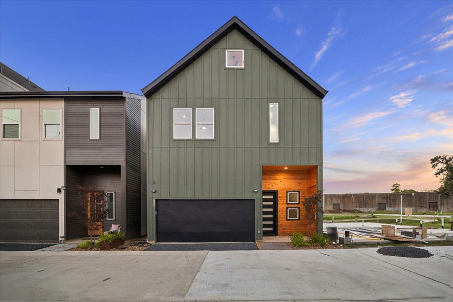 Front exterior of a new home in , Houston, TX, highlighting curb appeal (Image 1).