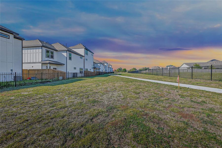 Exterior details and patio area of a home in Metro Village, Houston (Image 27).