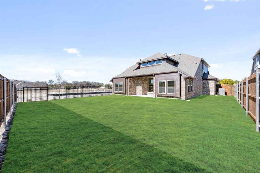 Exterior details and patio area of a home in Addison Hills Classic 60s, Cedar Hill (Image 4).