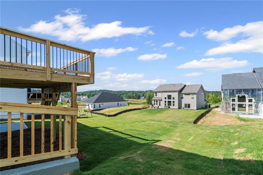 Front exterior of a new home in Twin Lakes, Braselton, GA, highlighting curb appeal (Image 1).