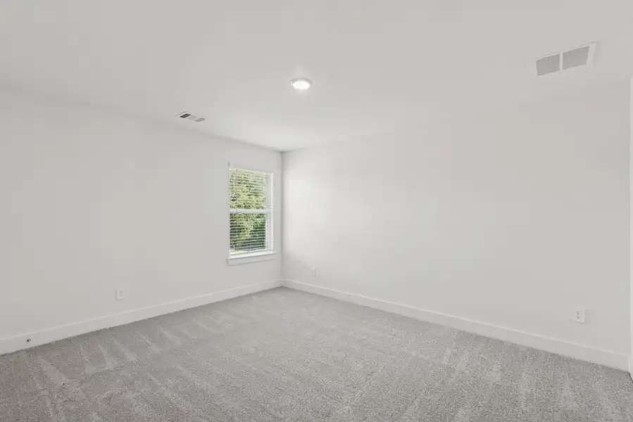 Spacious, unfurnished interior of a new home in Sorella, Tomball (Image 5).