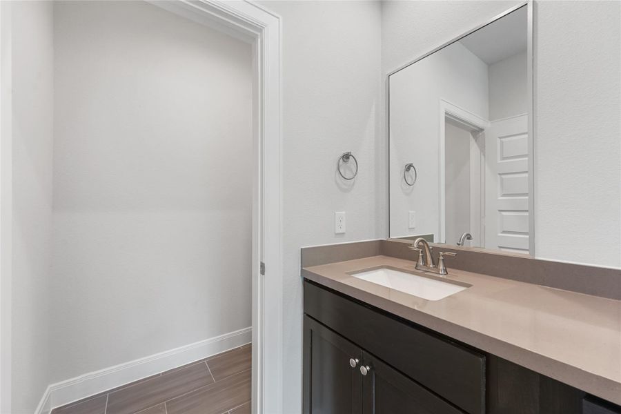 Furnished interior view inside a new home in The Corner At Buffalo Pointe, Houston (Image 5).
