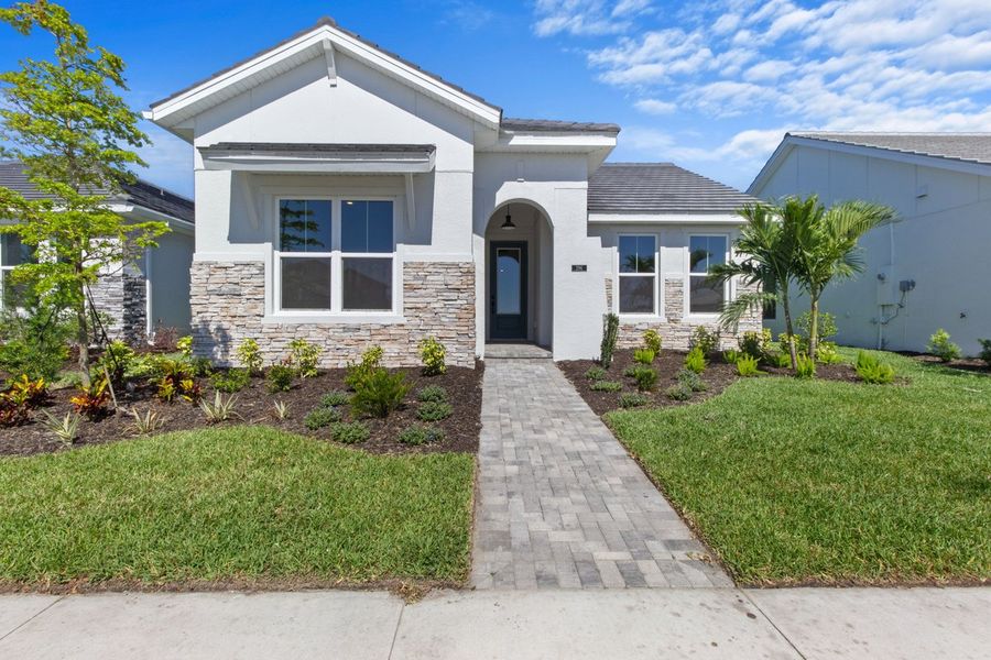 Representative exterior photo of a completed home built from the The Langham by David Weekley Homes in Vistera of Venice – Cottage Series, Nokomis, FL (Image 3).