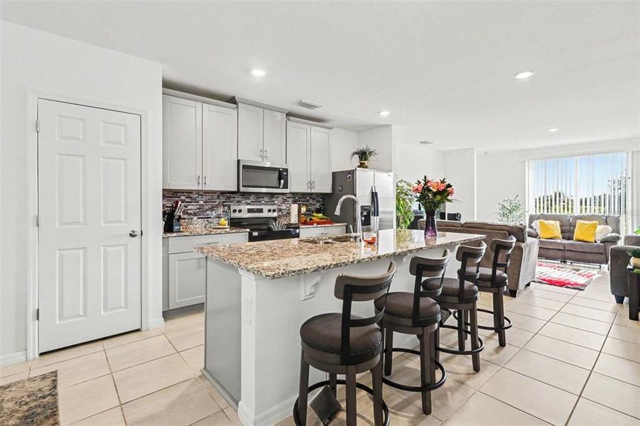 Furnished interior view inside a new home in Bradbury Creek - Classic Series, Haines City (Image 6).