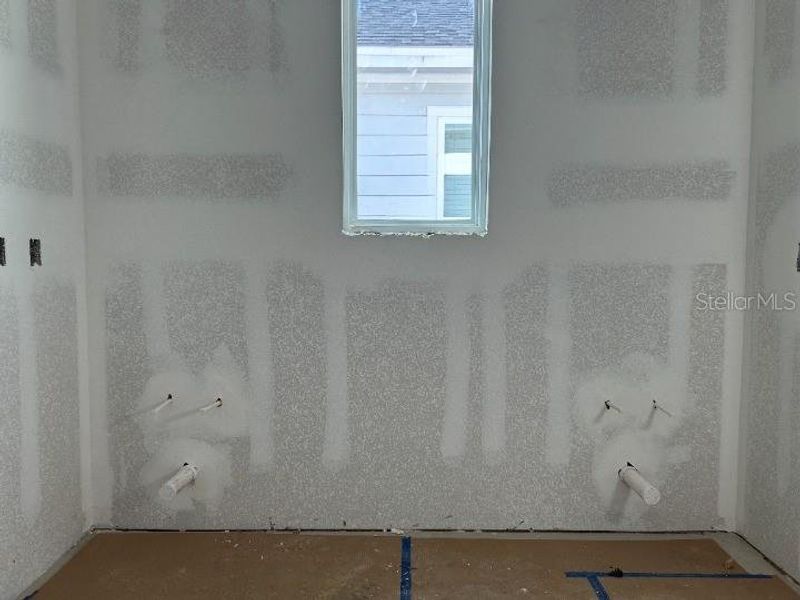 In-progress construction of a new home in Weslyn Park Single Family, St. Cloud, FL (Image 11).